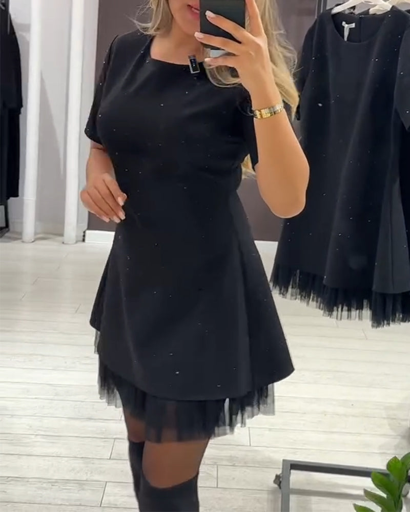 Elegante jurk met glinsterende mesh-patchwork