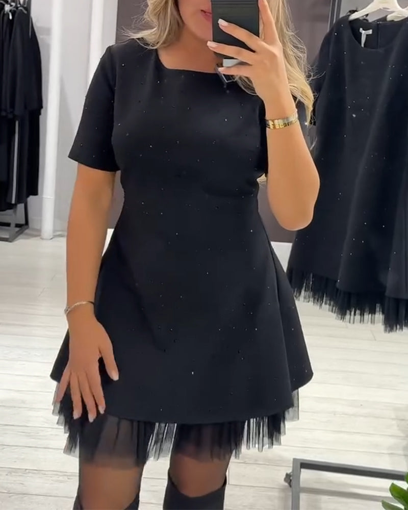 Elegante jurk met glinsterende mesh-patchwork