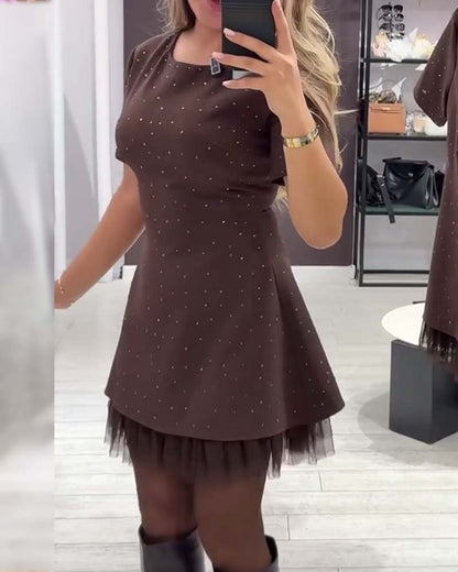 Elegante jurk met glinsterende mesh-patchwork